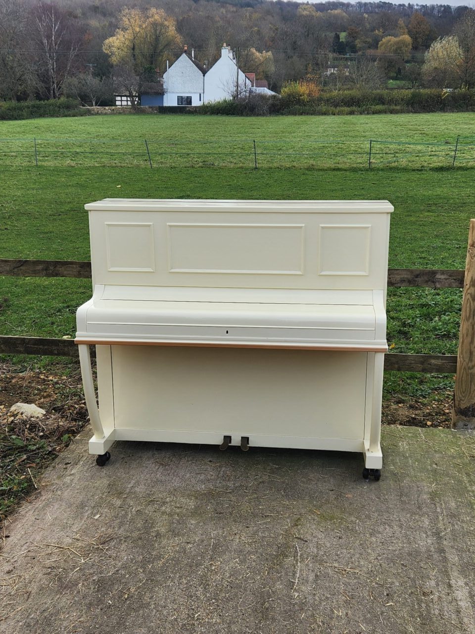 white upright piano
