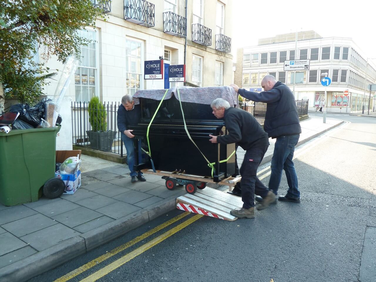 professional upright piano moving